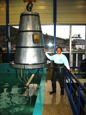 Image 3 - Bauer stands beside a diving bell after a dive in Norway in 2005.